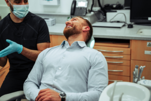 a patient chatting with their dentist